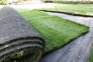 Laying The Turf Installation